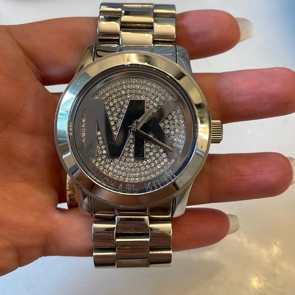 This watch is gorgeous! MK is in crystals. Perfect condition, working battery.